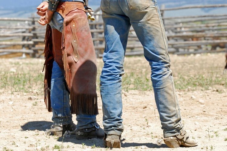 Cowboys wear jeans