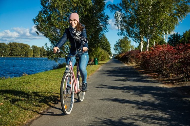 wearing jeans ride a bike