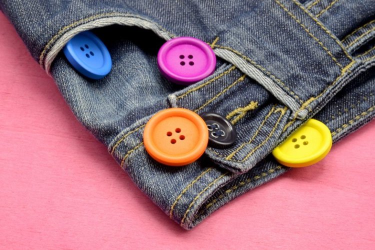 Colored buttons on denim