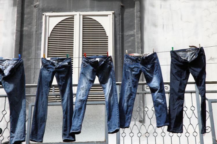 hang jeans in the sunlight to dry them
