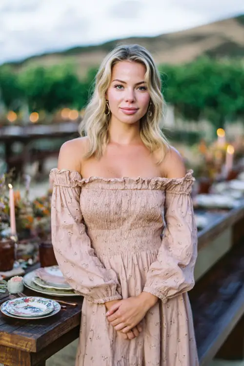 A petite guest in a soft pink off-the-shoulder dress with subtle sequin embroidery (2)