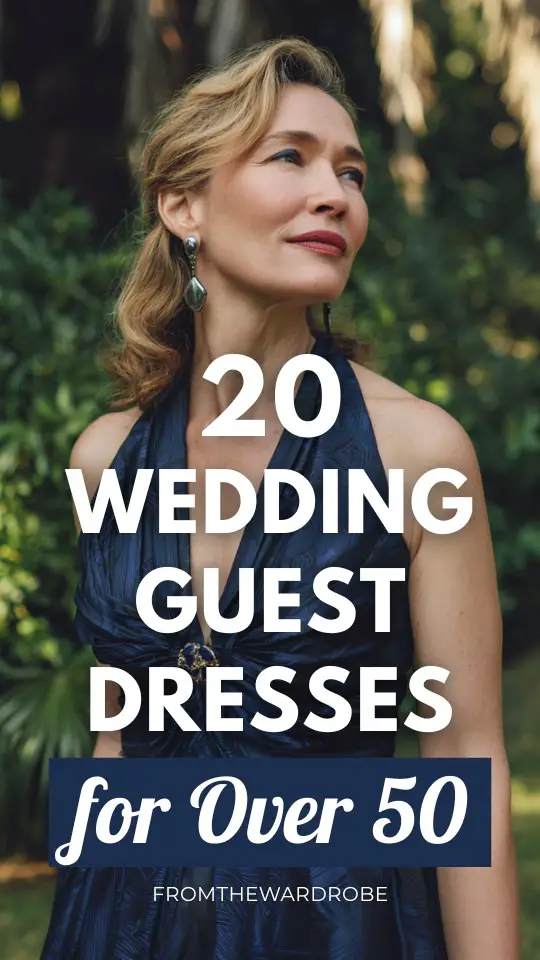 A woman over 50 wears a rich navy gown with a pleated bodice and tonal geometric jacquard pattern