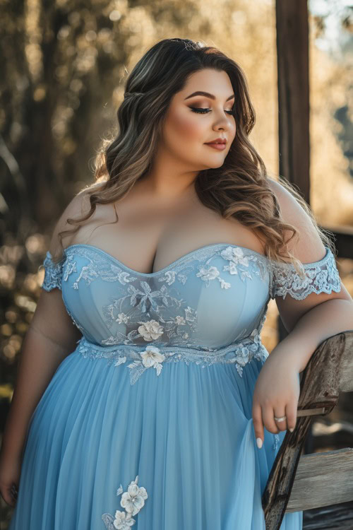 Chic plus-size woman in a pastel blue fit-and-flare dress with a scalloped neckline and 3D floral embroidery along the hemline