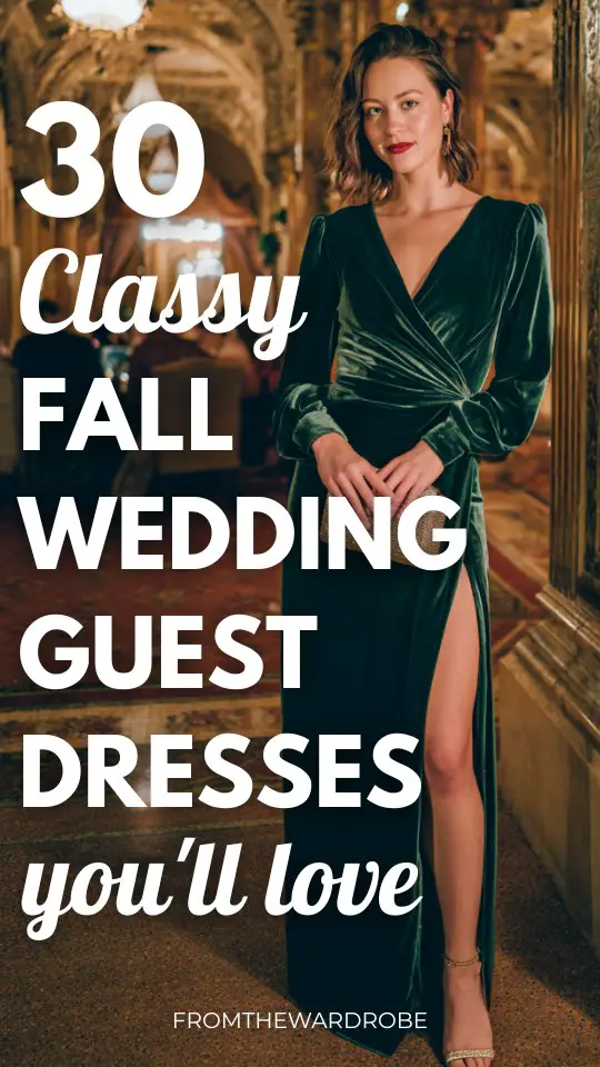A woman wears a classy emerald green fall wedding guest dress with a thigh-high slit
