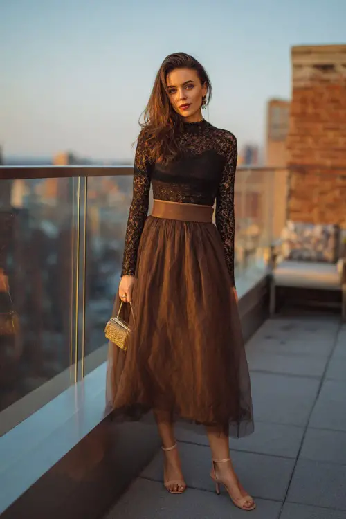 A woman wearing a tulle midi skirt, lace top, strappy heels, small shoulder bag, romantic rooftop dinner background, full-body editorial photo, soft cinematic lighting 