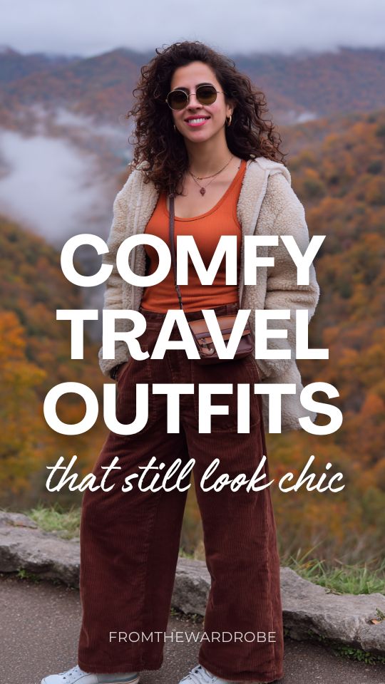 Woman wearing a comfy travel outfit with a rust-orange tank top, brown corduroy wide-leg pants, and a cream sherpa jacket