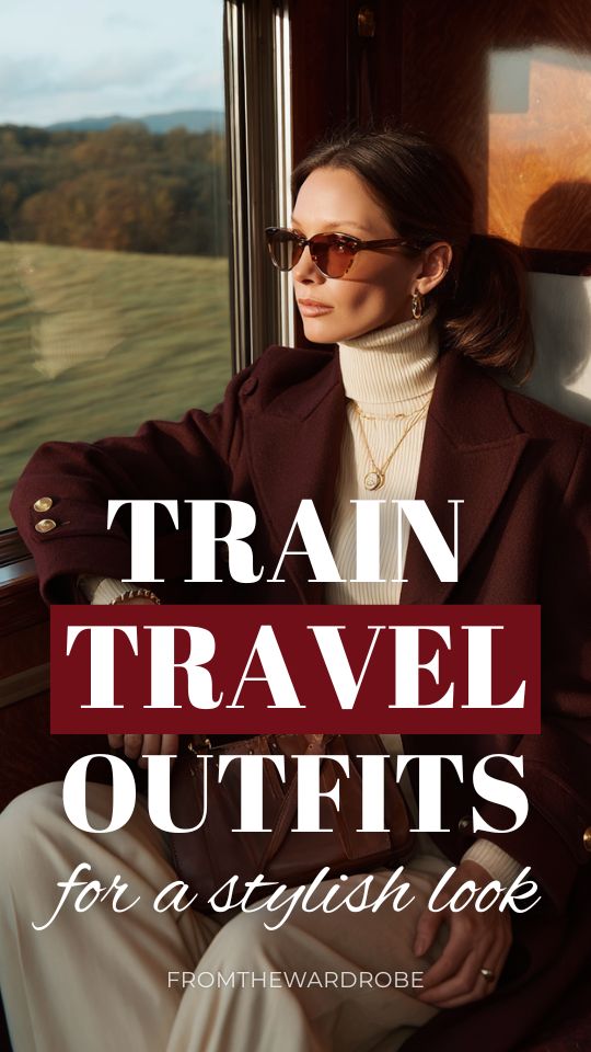 Woman wearing a train travel outfit with a cream turtleneck sweater, beige trousers, and a brown wool coat sitting by the window on a luxury train