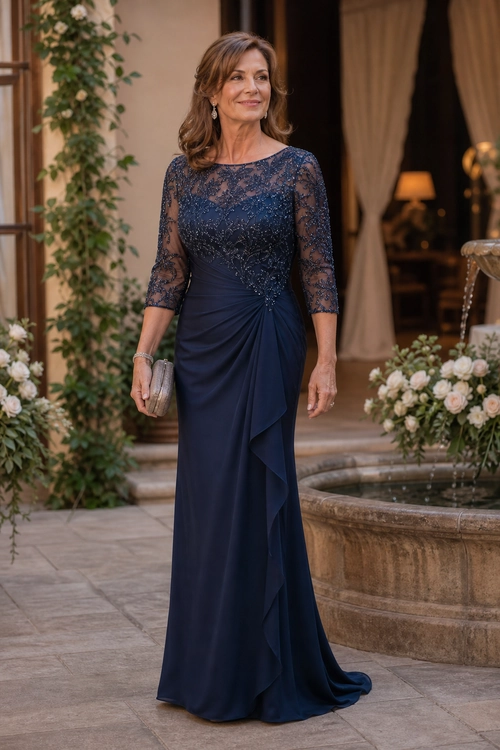 Navy Lace Evening Gown A woman wears a floor-length navy gown with a lace bodice, three-quarter sleeves, draped ruching, and a small metallic clutch.