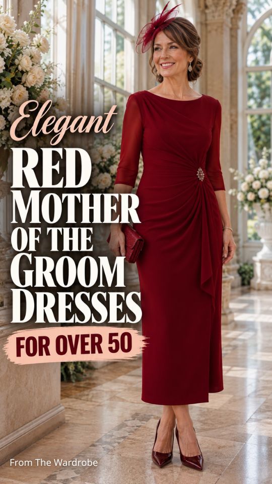 A woman over 50 wears a red mother of the groom dress with burgundy heels, clutch, and feathered fascinator